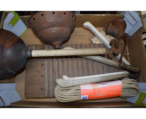 A collection of vintage items to include washing grabs, a wooden washing board, pegs, a washing line, copper possers and othe