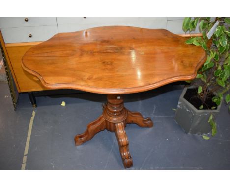 19th century French Walnut occasional table sitting on four legs. 102cm x 66cm height 73cm.  Generally in good original antiq