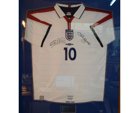 A signed England football shirt "10 Michael Owen" Signed by Micheal Owen and David Beckham, England Captains. England v Slova