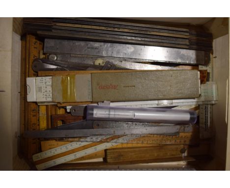 A good collection of vintage rulers to include wooden, metal and plastic versions for multiple purposes (Qty).  