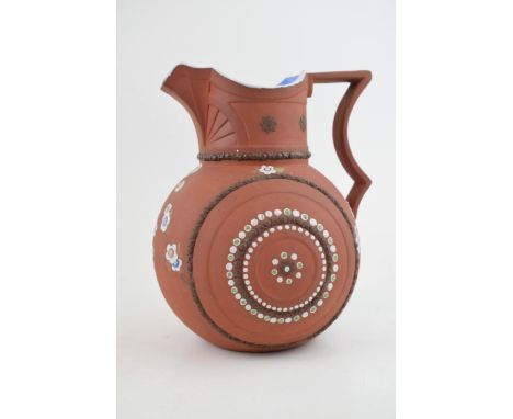 An early 19th century moulded stoneware terracotta G R Booth jug, c. 1839. It has hand-painted flowers, sprig moulded details