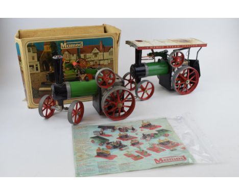 Two Mamod Traction Engine, live steam vintage toys together with a Mamod box, catalogue and accessory. (4)  In playworn condi