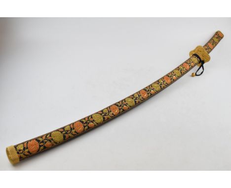 A vintage decorative Samurai sword in embroidered sheath, engraved blade and brass hilt. Length 96cm.  In good vintage condit