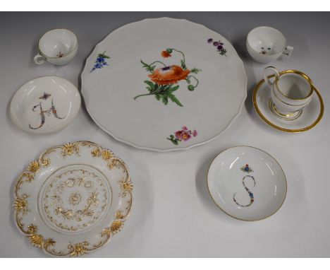 Continental porcelain including a Meissen cake plate, cups, saucers and relief moulded plate with blue crossed swords mark.