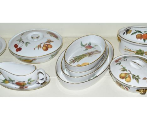 Approximately twenty nine pieces of Royal Worcester dinner ware decorated in the Evesham Gold pattern