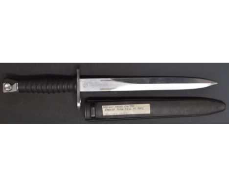 Swiss SIG 1957 pattern with 24cm double edged blade, 363963 to ricasso, with scabbard.&nbsp;PLEASE NOTE ALL BLADED ITEMS ARE 