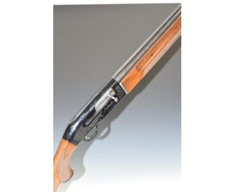 Beretta A301 12 bore three-shot semi-automatic shotgun with engraved locks, chequered semi-pistol grip and forend, vented top