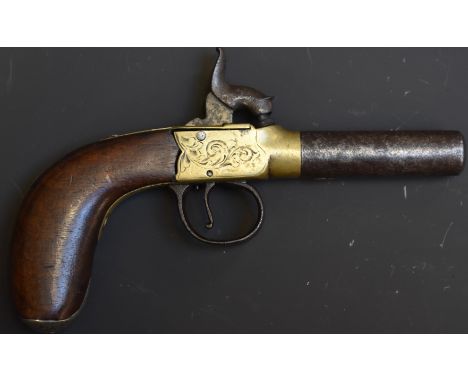 Percussion hammer action pocket pistol with engraved brass lock, engraved white metal butt cap, shaped wooden grip, vacant ca