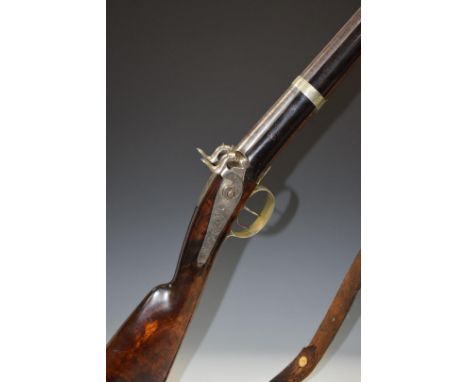 Italian double barrelled over and under percussion hammer action gun with engraved locks, hammers, butt plate, trigger guard 