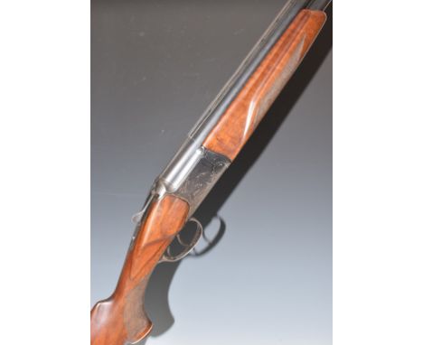 Baikal 12 bore over and under ejector shotgun with engraved scenes of deer to the locks,&nbsp;engraved underside, top plate, 