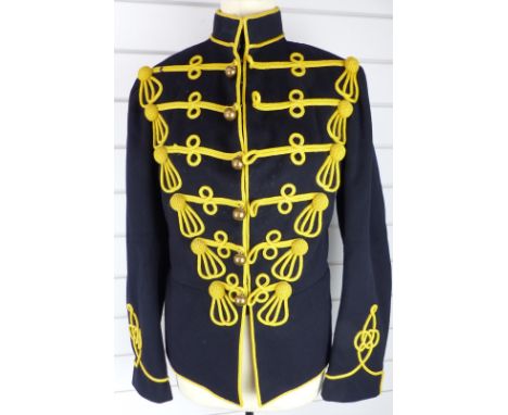 British Army Hussars full dress tunic of black cloth with six loops of yellow mohair cord to front and single row of domed bu