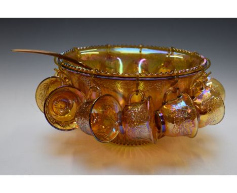 Carnival glass punch bowl, cups and associated ladle, H18, diameter 31cm