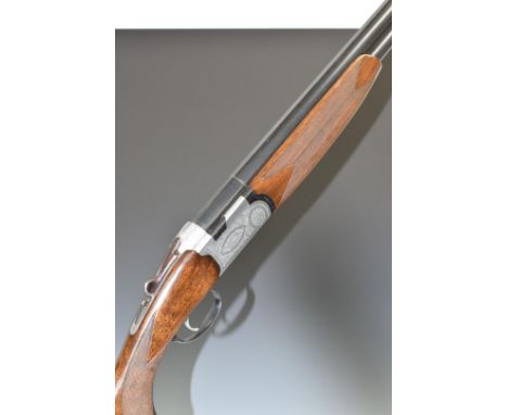 Beretta S56E 12 bore over under ejector shotgun with named and engraved locks, engraved underside, trigger guard, top plate a