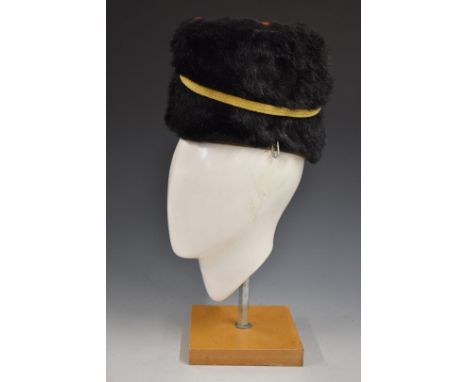 British Army WW1 Royal Gloucestershire Hussars fur busby retaining yellow cord line and scarlet bag, with Hobson & Sons of Lo