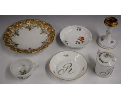 Meissen porcelain chocolate cup, cover and saucer, relief moulded plate and candlestick and a Berlin cup and saucer decorated