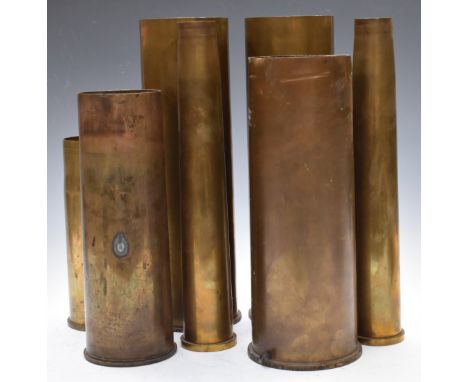 Seven Cold War&nbsp;brass shells including 105mm dated 1969 and 25 pounder dated 1955, tallest 37cm