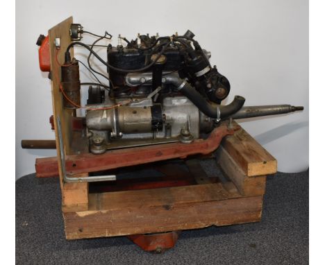 Three bearing Austin Seven engine, on test stand with ancillaries including carburettor, fuel pump, starter motor, dynamo and