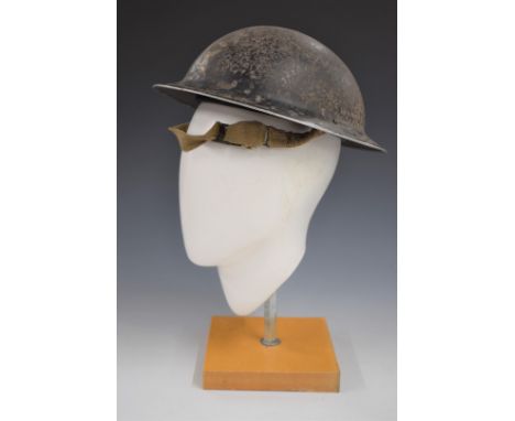 WW2 British 'Brodie' steel helmet stamped RFM 1939 to rim with R to front complete with liner and chin strap