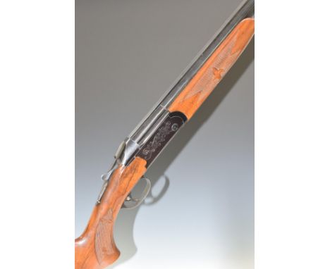 Valmet 12 bore over and under ejector shotgun with engraved lock and underside, chequered semi-pistol grip and forend, single