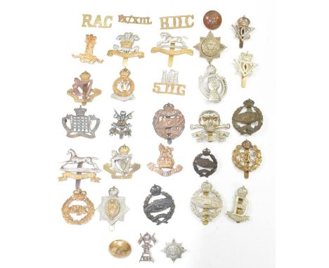 British Army small collection of Cavalry / Royal Armoured Corps metal badges including Dragoon and Dragoon Guards regiments e