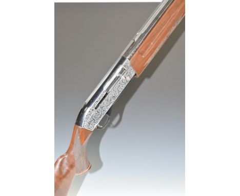 Shadow F-1 12 bore three-shot semi-automatic shotgun with engraved locks, chequered semi-pistol grip and forend, vented top r