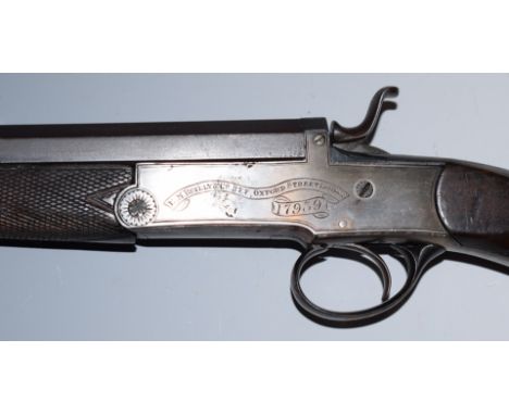 E M Reilly .380 hammer action rook rifle with chequered semi-pistol grip and forend, carved horn butt cap, line engraved lock