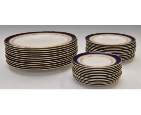 Approximately thirty eight pieces of Royal Worcester dinner ware decorated in the Regency pattern