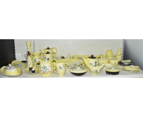 Approximately thirty nine pieces of Carltonware Australian design tea and tableware decorated in the Magnolia pattern on yell