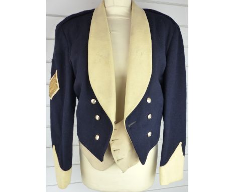 British Army Sergeant's mess jacket in blue and buff cloth with black silk lining and waistcoat with Sergeant's chevrons to r