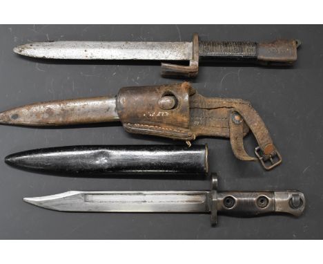 British L1 A3 bayonet with long fulllered 20cm blade and&nbsp;scabbard together with a Belgium FAL bayonet with plastic grips