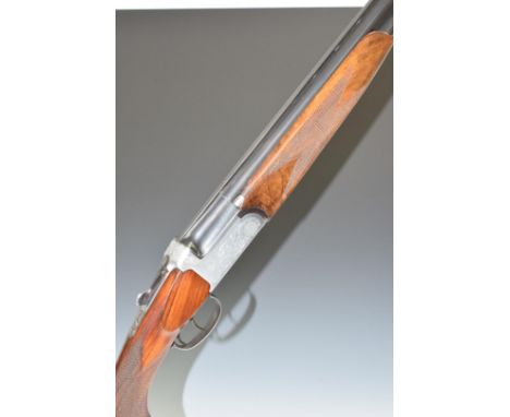 Contento 12 bore over and under shotgun with engraved lock, trigger guard, underside, top plate and thumb lever, chequered se