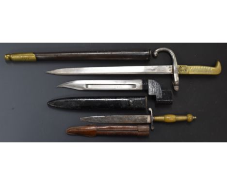 Three bayonets / knives comprising British Number 9 Mk 1 with 20cm fullered blade and scabbard and a shortened continental ba