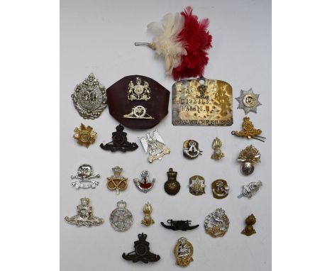 Small collection of British Army cap badges including Royal Artillery, Argyll &amp; Sutherland Highlanders, Royal Scots Drago