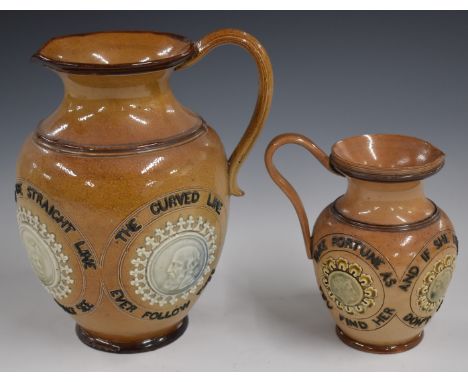 Two Royal Doulton Mottoware jugs with portrait cartouche, tallest 20cm