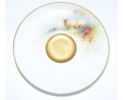 Royal Worcester hand painted cabinet saucer by Ernest Barker, painted with two sheep grazing in a mountainous Highland landsc
