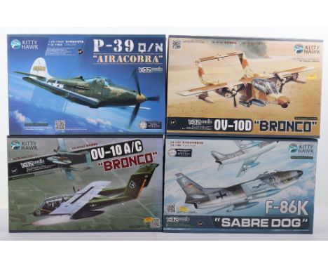 Four Kitty Hawk 1:32 scale Fighter Aircraft model kits, P-39 Q/N ‘Aircobra’ with extra detail up parts, OV-10D ‘Bronco’ with 