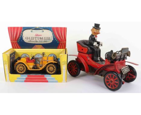 Two Vintage Tinplate old-timer style toys, including a boxed clockwork Schuco 1225 old-timer mercer type 35j 1913, box is in 