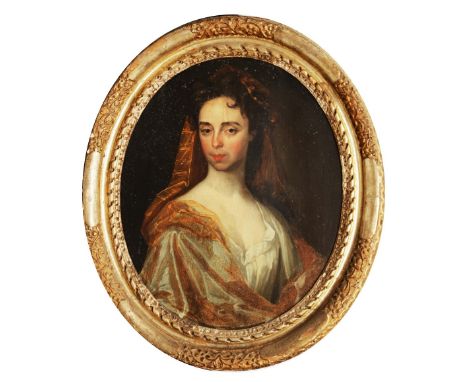 CIRCLE OF SIR GODFREY KNELLER (1646-1723) Bust length portrait of a lady wearing a brown headdress, white frock and shawl, oi