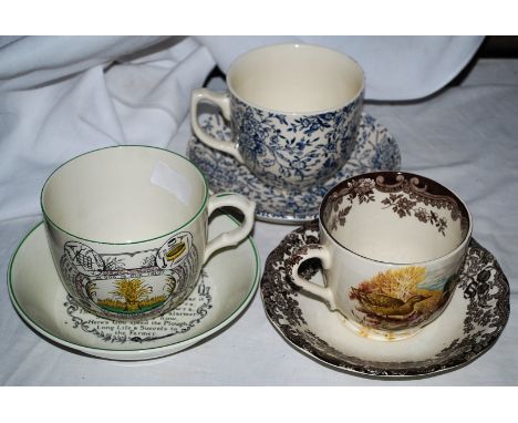 Three large cups with saucers of countryside theme