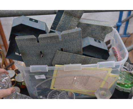 A plastic fort with figures