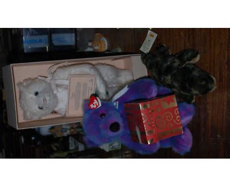 A limited to 2500 Merrythought Princess Diana inspired bear with certificate along with a Steiff crocodile and one other