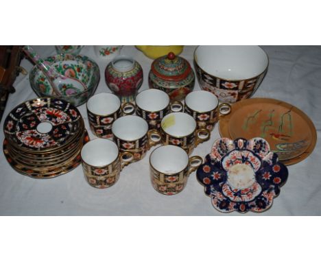 Small Oriental cups and saucers with others