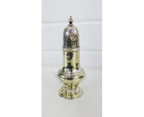 A George III silver sugar castor, the detachable pierced top with a  baluster finial, bearing makers mark for Samuel Wood, Lo