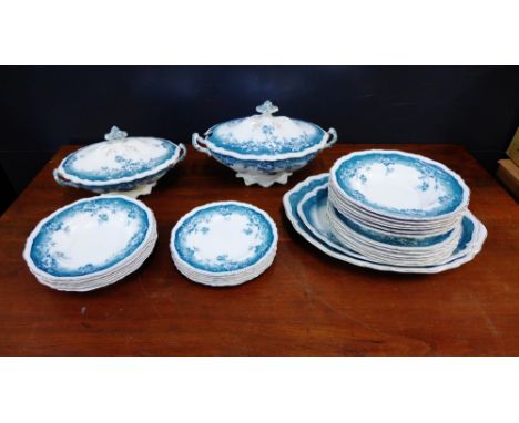 A Staffordshire dinner service comprising tureens, plates and bowls etc.
