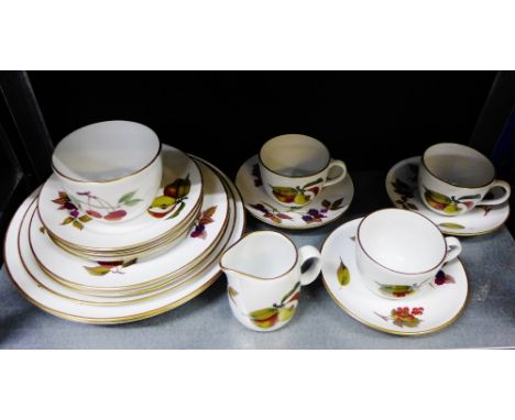 A collection of Royal Worcester 'Evesham' pattern table wares to include three cups, three saucers, three side plates, three 