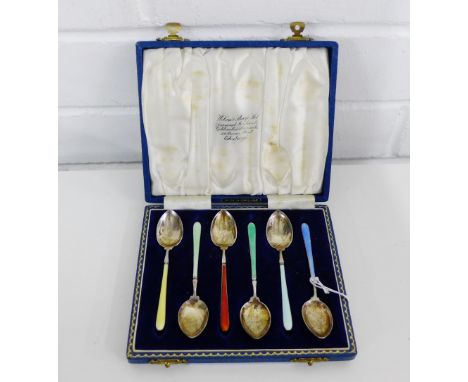 A harlequin set of six silver and enamel teaspoons, in fitted case, bearing makers mark for Henry Clifford Davis, Birmingham 