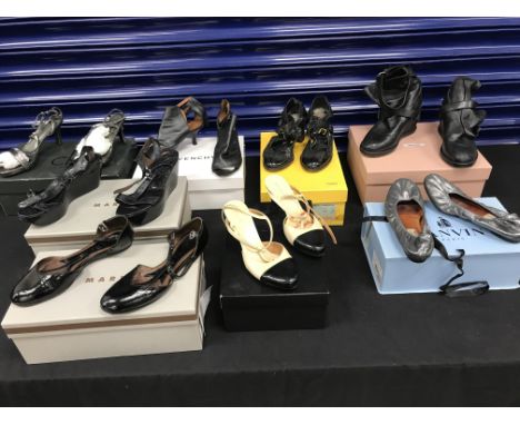 A box containing eight pairs of designer shoes by Marni, Fendi, Dries Van Noten, Lanvin, Miu Miu, Givenchy, Calvin Klein (See