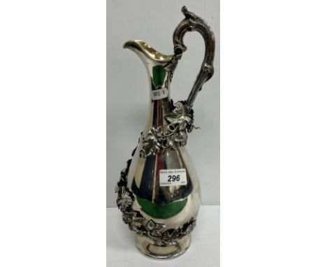 A Victorian silver baluster shaped wine ewer with applied grape and vine decoration (by Edward John and William Barnard, Lond