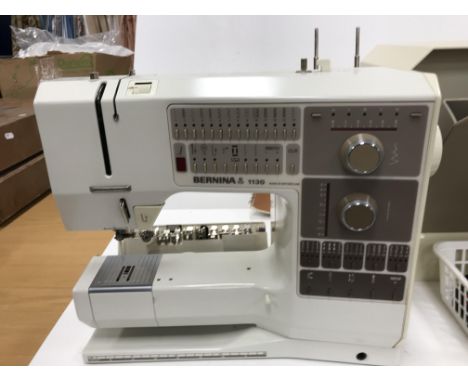 A Bernina 1130 sewing machine with accessories and instruction manuals CONDITION REPORTS Knee lift is present. Unknown if wor