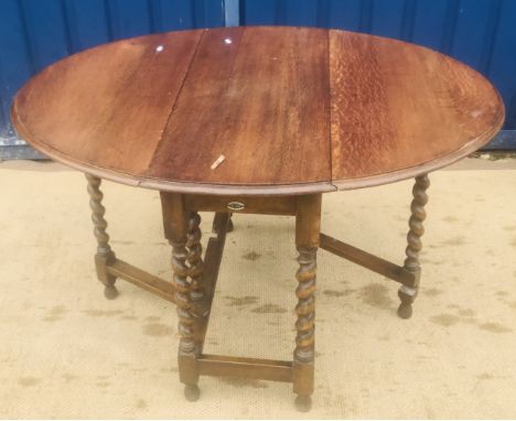 A painted rectangular dining table on cabriole legs to pad feet, a mahogany oval dining table on cabriole legs to pad feet, a